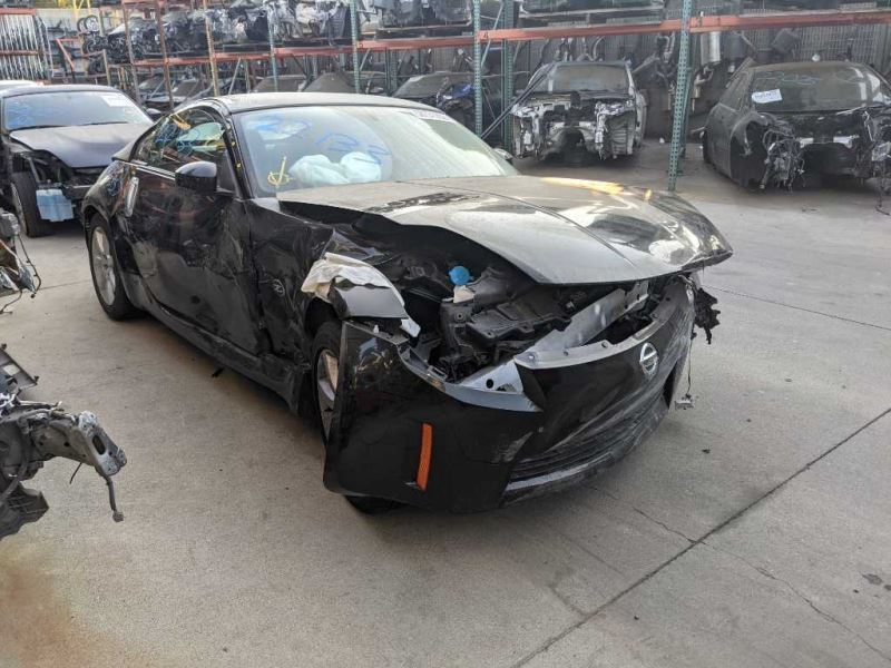 03-04 Nissan 350Z 5k Miles Driver Side Lower Knee Panel Black/G OEM 68106CD000