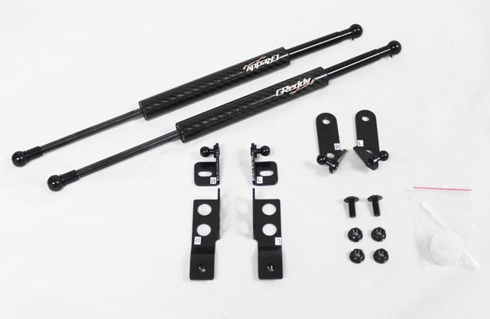 GReddy 05-07 Subaru WRX/STi Engine Hood Lifter Kit (Designed for OEM weight hoods.)