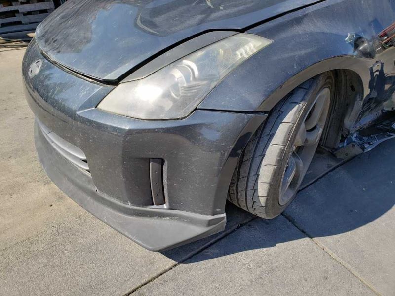 03 Nissan 350Z Driver Side Rear Lower Finisher (Black) OEM 76901-CD000