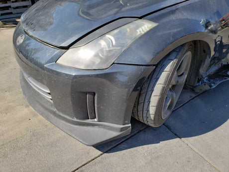 03 Nissan 350Z Driver Side Rear Lower Finisher (Black) OEM 76901-CD000