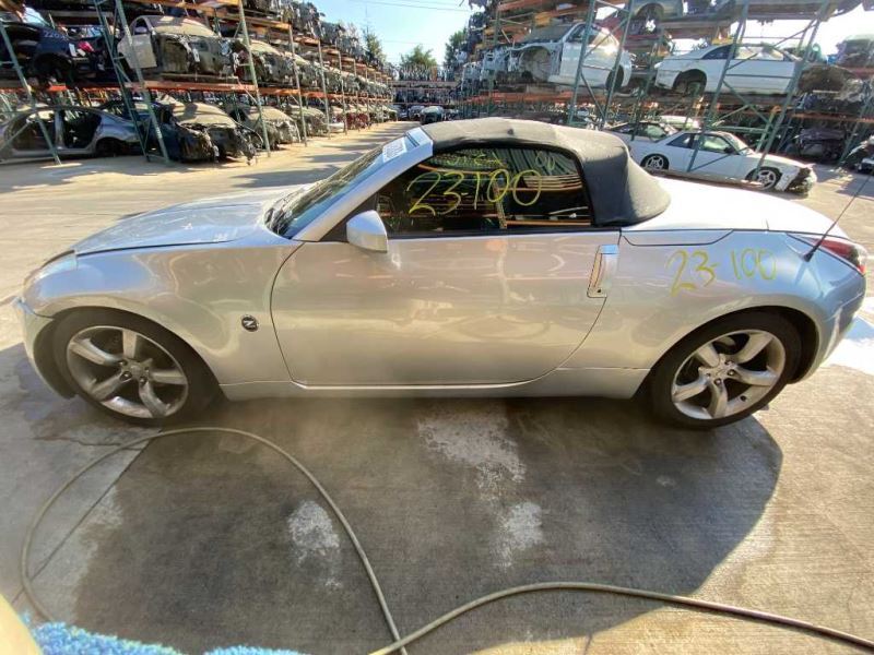 03-04 Nissan 350z Conv. Fuel Filler Door Silver (KY0) OEM 78830CD061