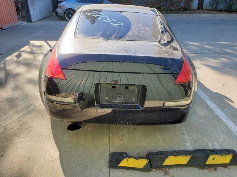 03-04 Nissan 350z Driver Door Trim Panel Black (G) OEM 80901CD000