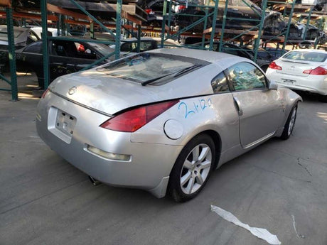 03-04 Nissan 350z Shifter Bezel (A/T) OEM 96913CD000