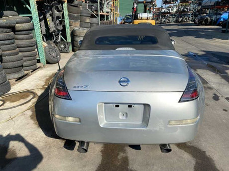 03-04 Nissan 350z Conv. Fuel Filler Door Silver (KY0) OEM 78830CD061