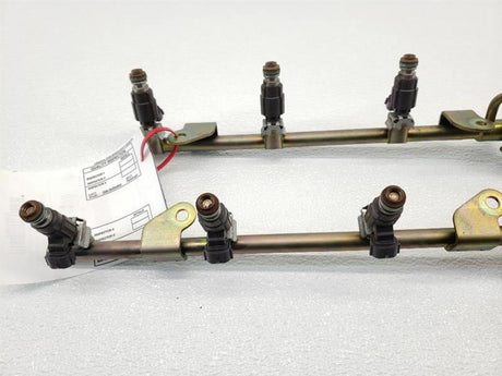 03-04 Nissan 350z FX35 G35 01-03 QX4 FBJC100 INJECTORS W/ RAIL 166005L700 OEM