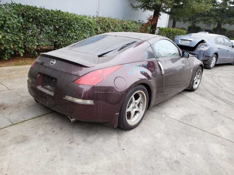 03-04 Nissan 350z Passenger Side View Mirror Burgundy (AX8) OEM