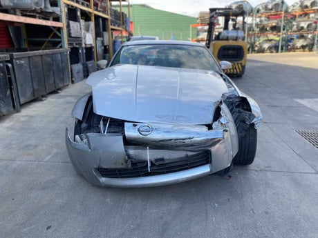 03-05 NISSAN 350Z Console Padded Trim Pair Black/G OEM 68135CD000