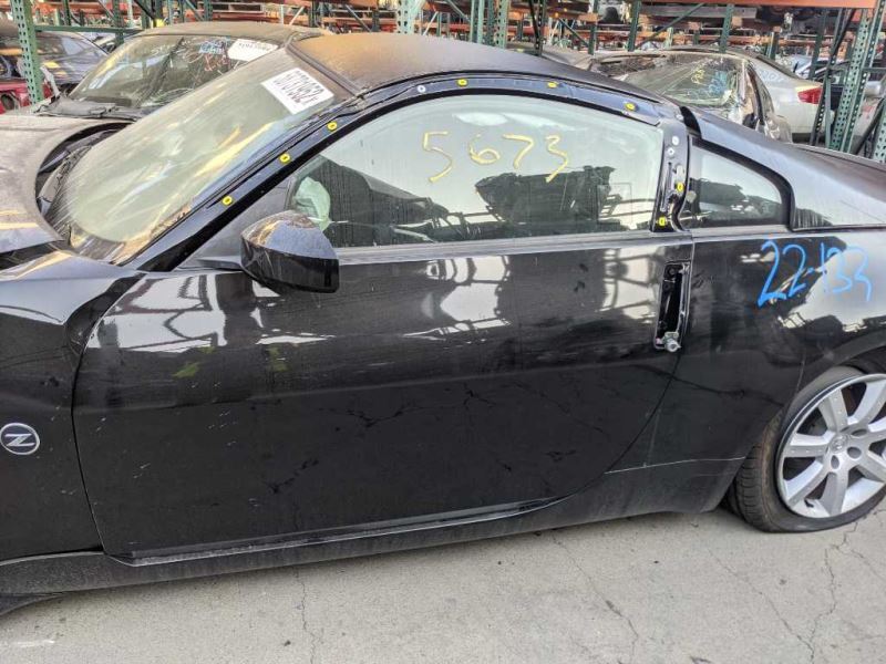 03-04 Nissan 350Z 5k Miles Driver Side Lower Knee Panel Black/G OEM 68106CD000