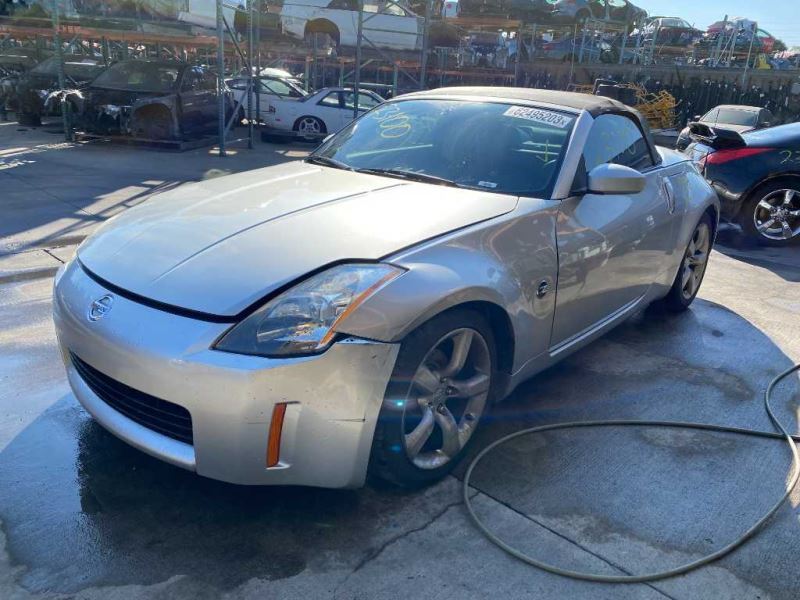 03-04 Nissan 350z Conv. Fuel Filler Door Silver (KY0) OEM 78830CD061