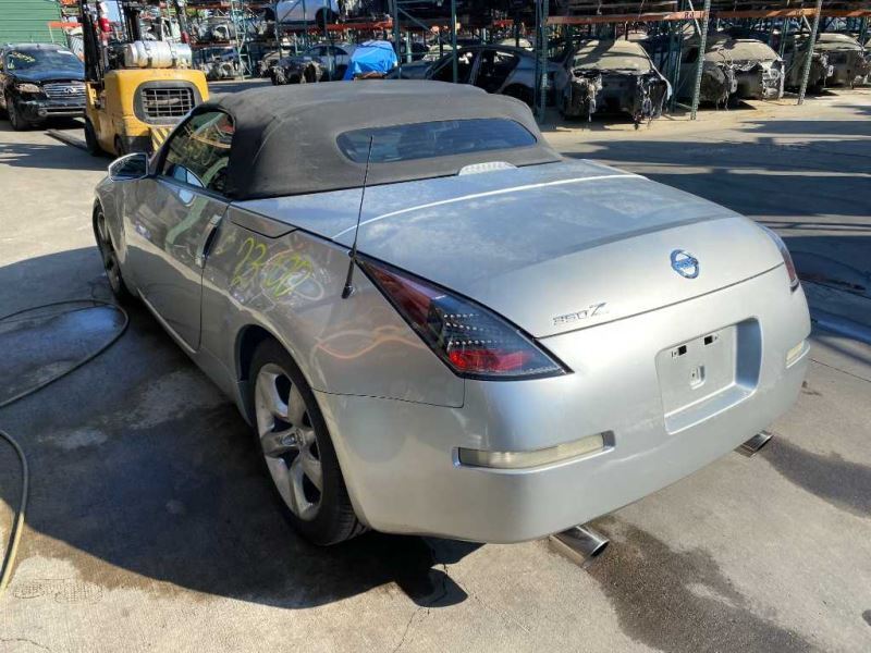 03-04 Nissan 350z Conv. Fuel Filler Door Silver (KY0) OEM 78830CD061