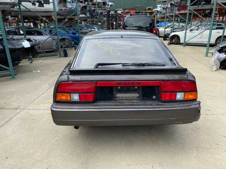 83-88 NISSAN 300ZX Z31 Center Dash Coin Cubby Black/T OEM 