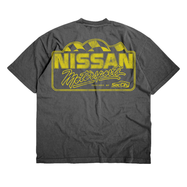 Back of charcoal Nissan Motorsports Shop T-shirt with a large yellow Nissan Motorsports graphic.