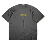 Front of charcoal Nissan Motorsports Shop crew neck T-shirt with a small yellow Sac City chest logo.