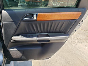 R/R DOOR TRIM PANEL - BLACK(G)