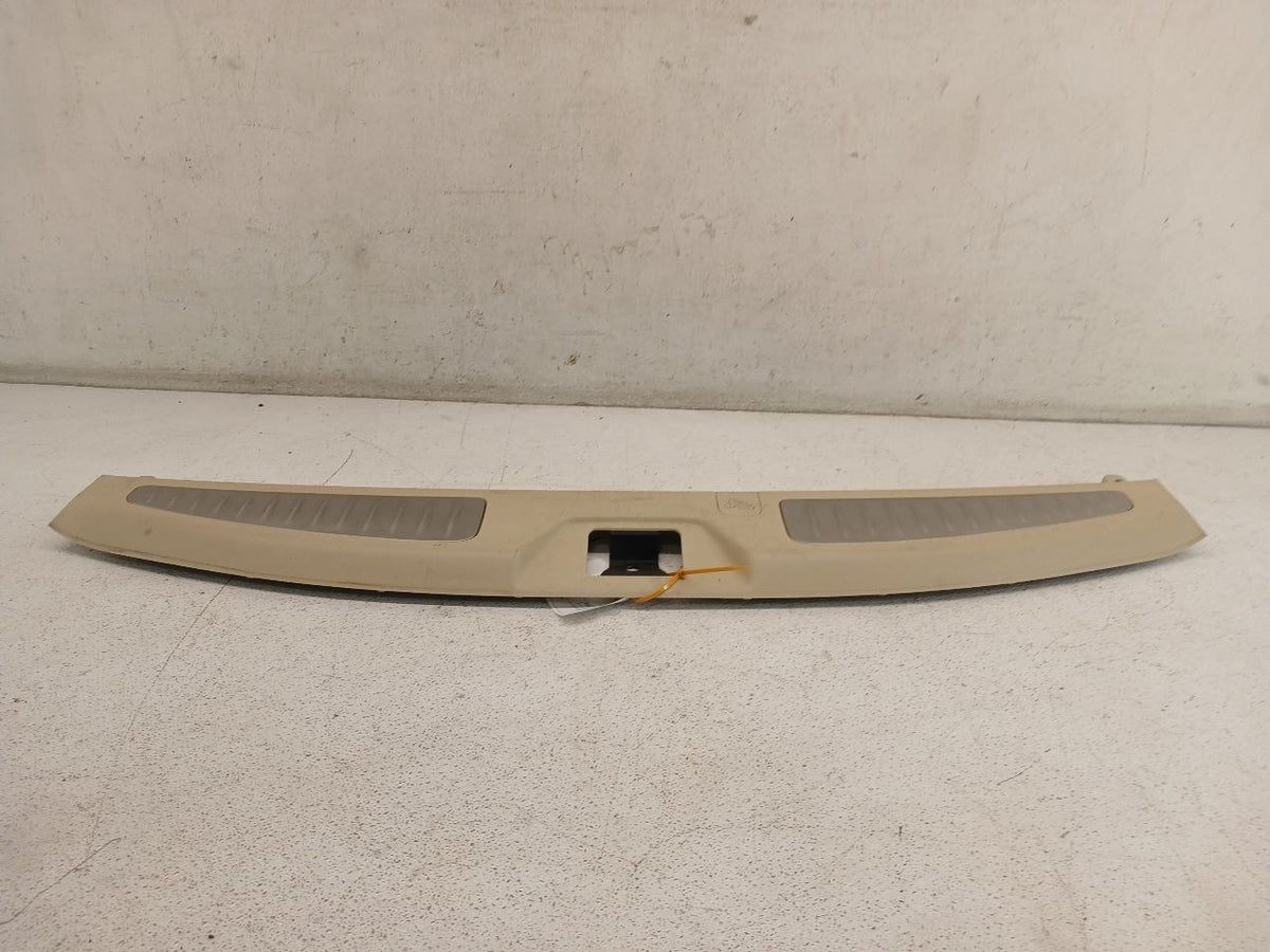 REAR TRUNK PANEL STRIKER-BEIGE