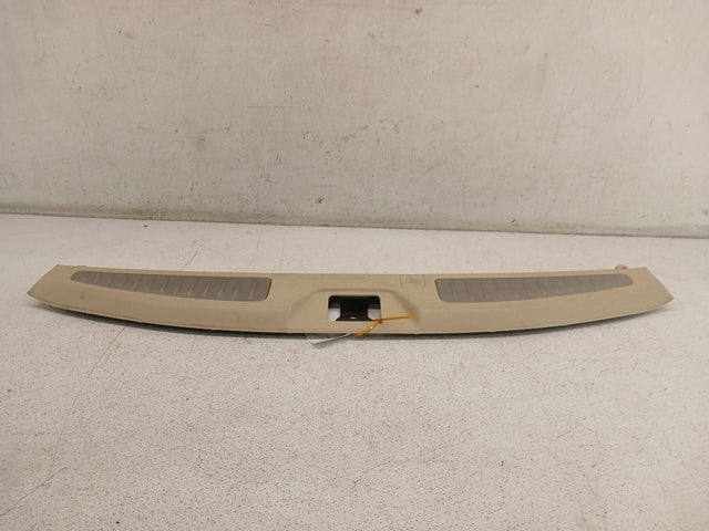 REAR TRUNK PANEL STRIKER-BEIGE
