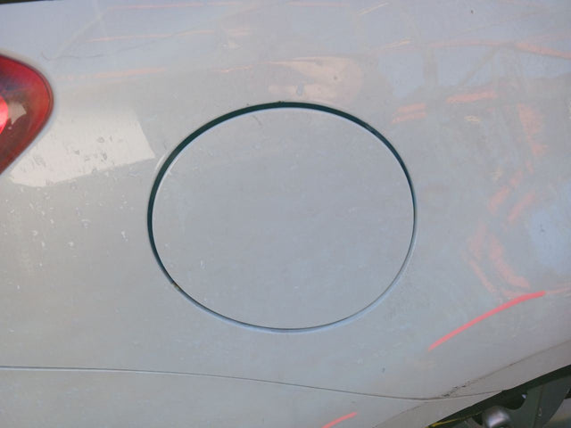 CONV- FUEL FILLER DOOR - WHITE(QAA)
