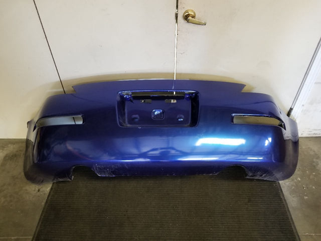 REAR BUMPER WITH DAMAGE AS-IS
